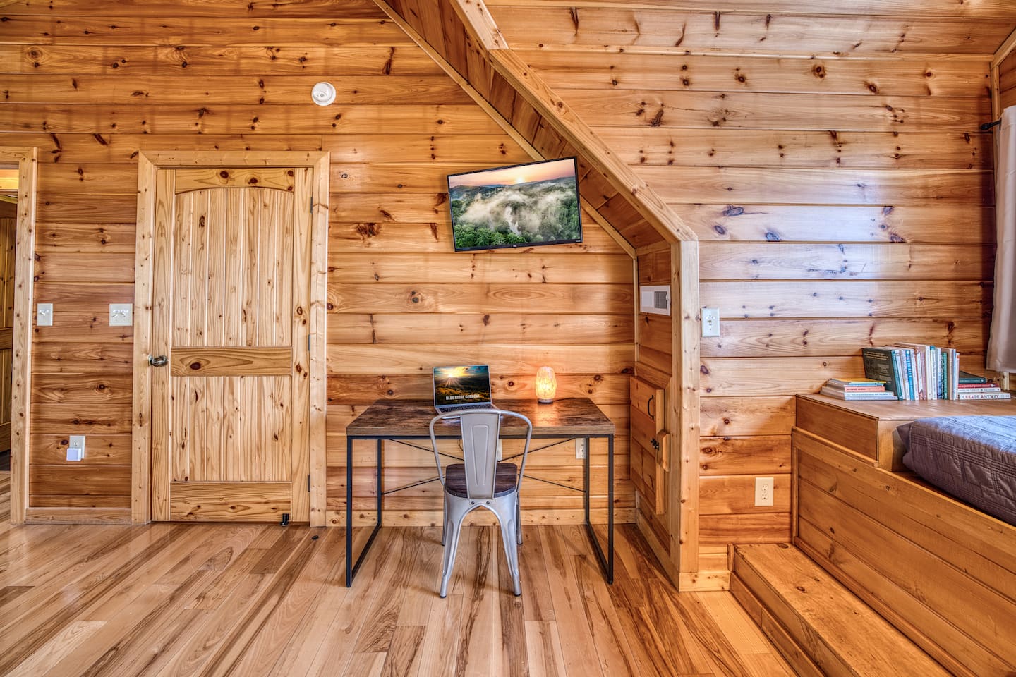 Both upstairs bedrooms also have a desk and chair workspace.