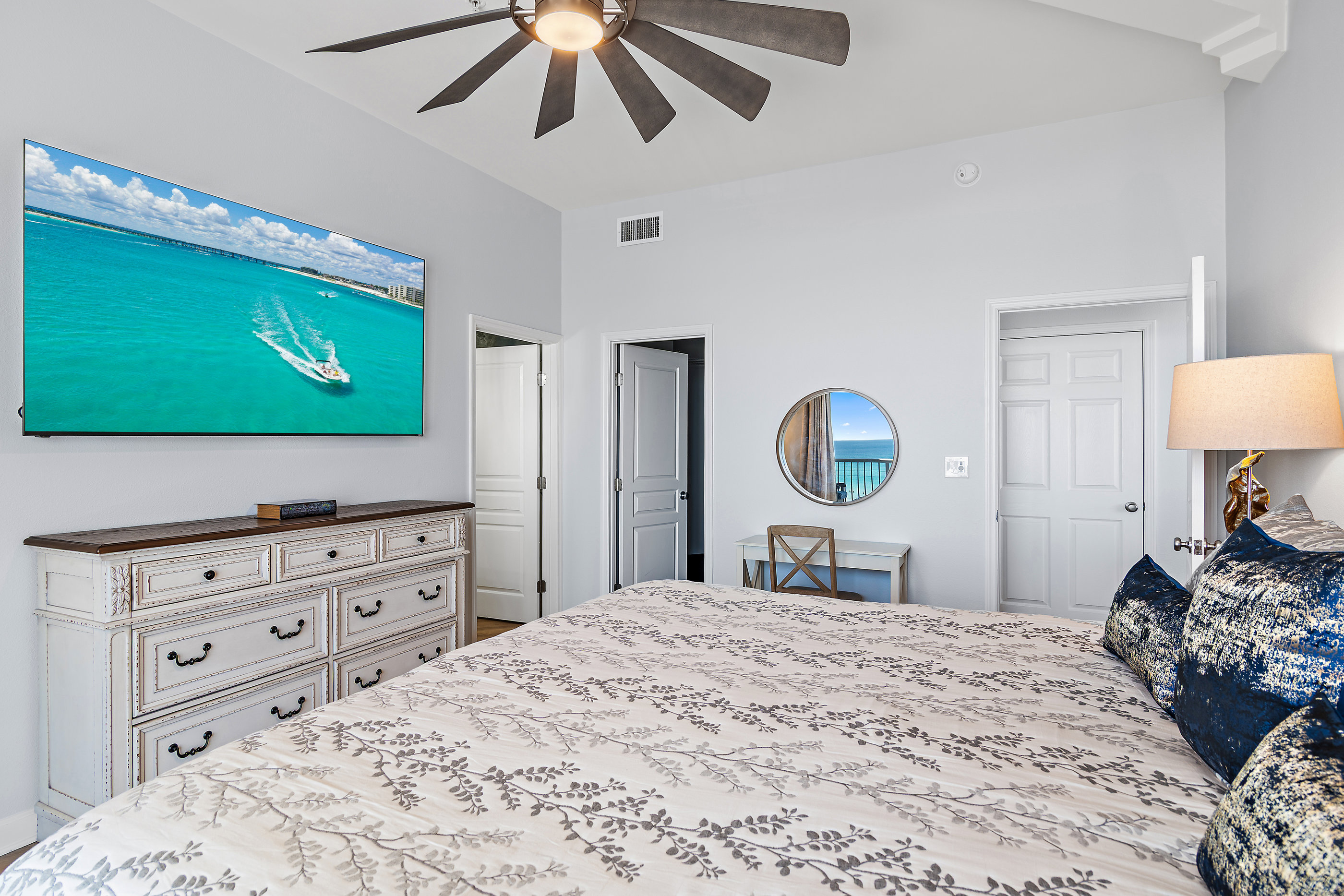 Master bedroom with wall‑mounted Smart TV