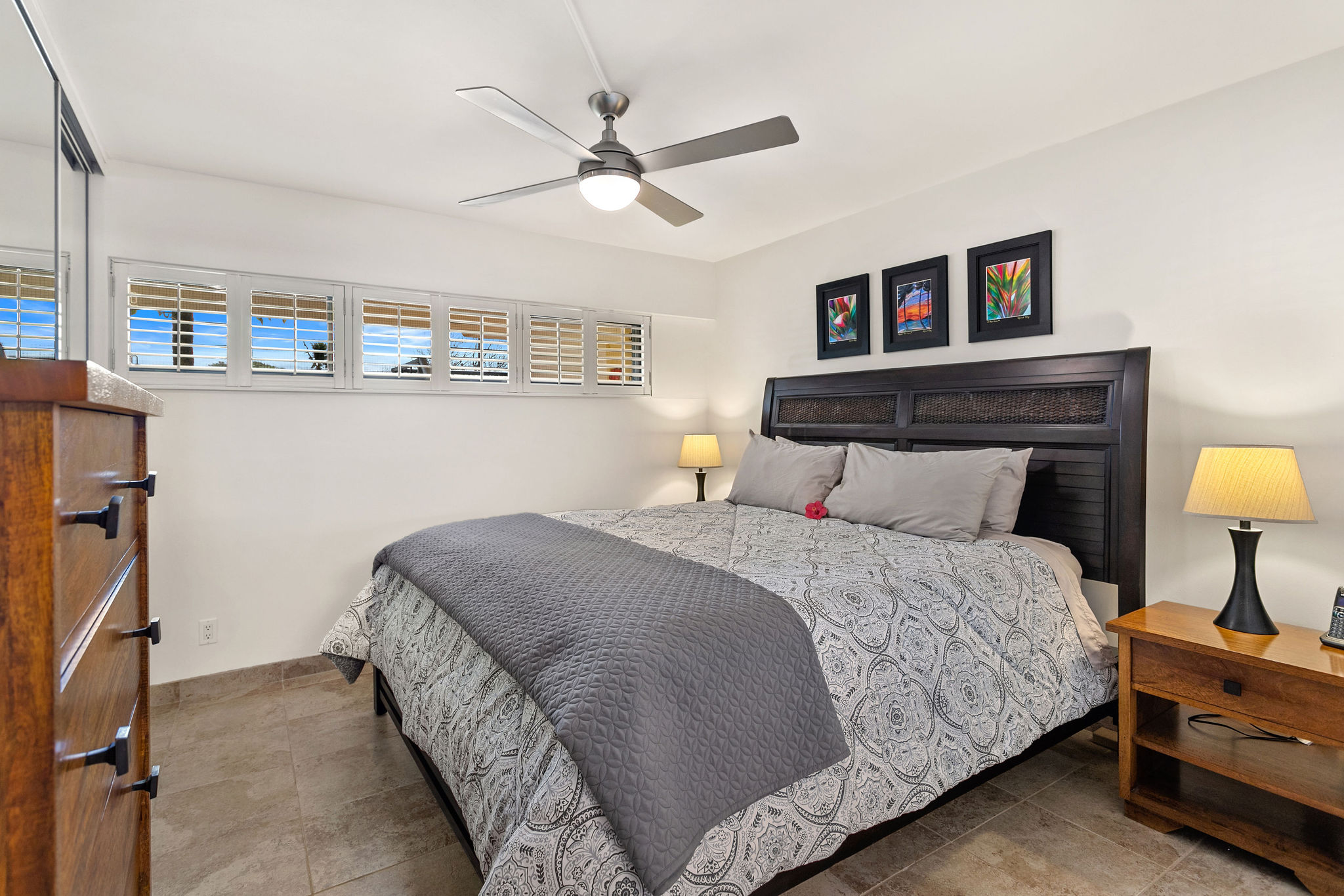 Step into the bedroom with its Cal-king bed and plantation style shutters and internet enabled TV