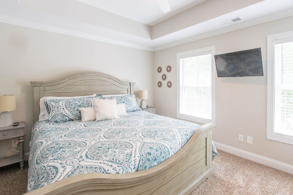 Bedroom 3 with Queen Bed and Mounted TV