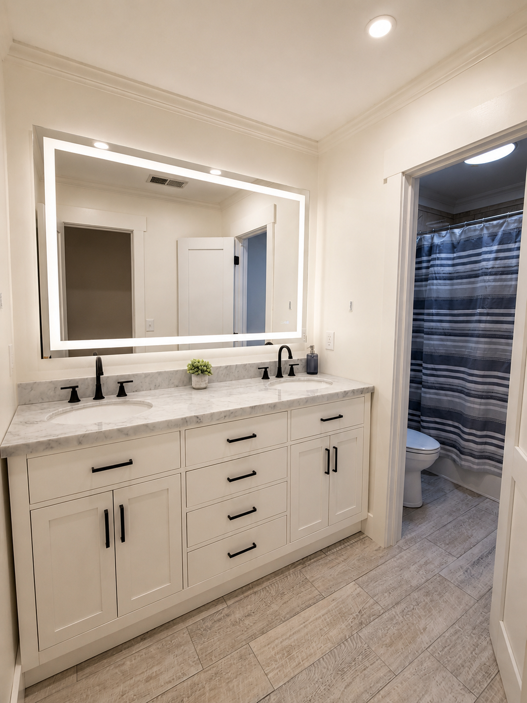 Spacious main bathroom with double sinks