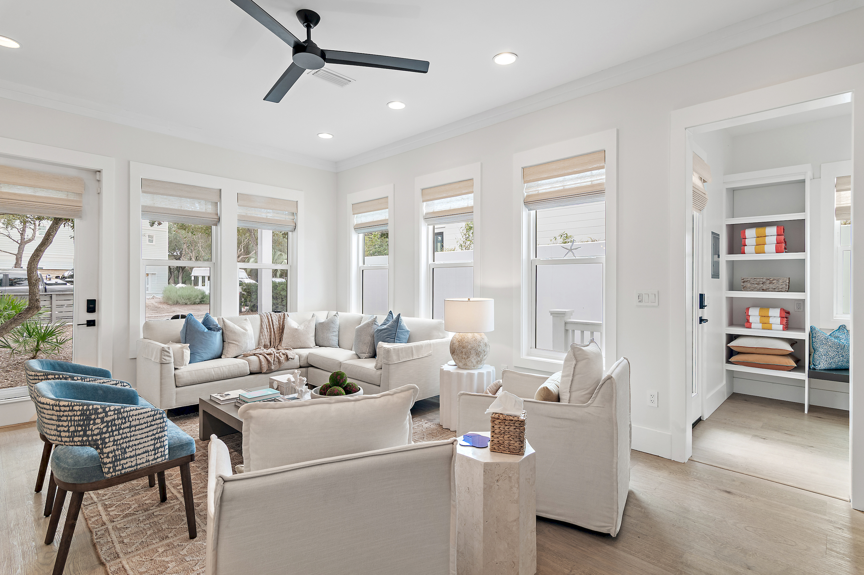 the light filled living room offers abundant space for everyone to relax.