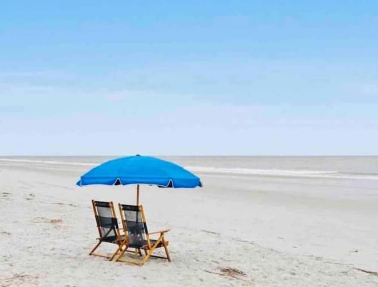 Beach chairs and umbrella