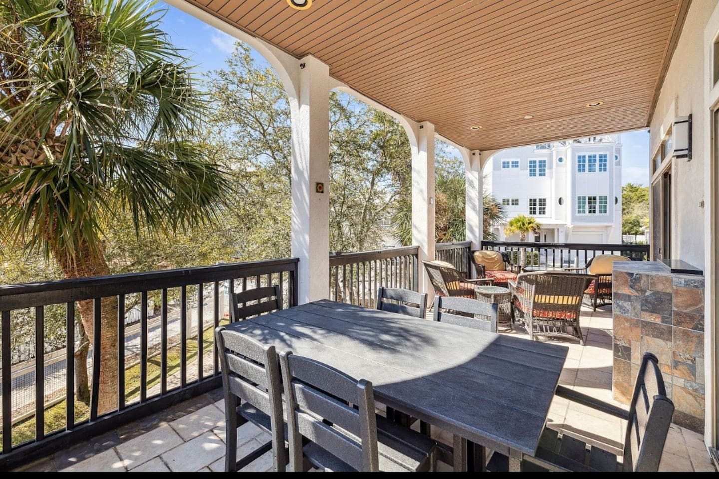 Main floor balcony with space to gather, relax and eat
