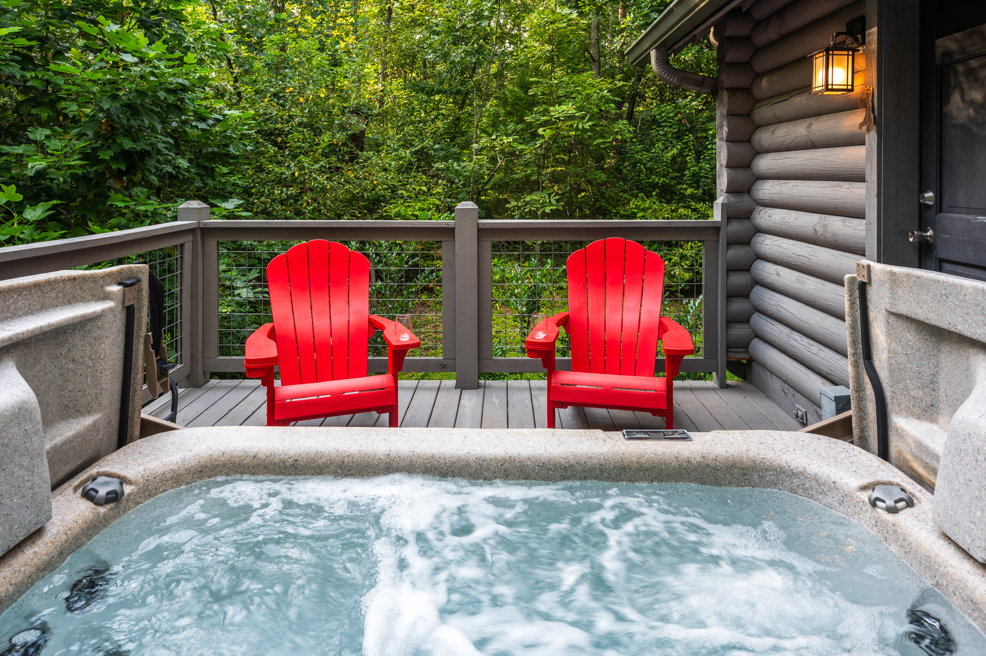 Relax in the hot tub or red chairs.