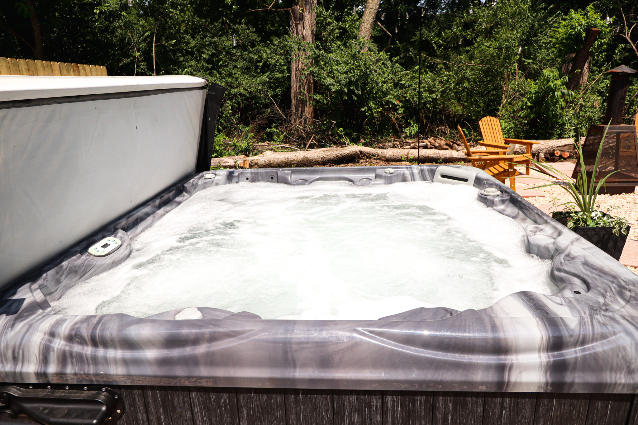 Relax in your private hot tub surrounded by peaceful country views