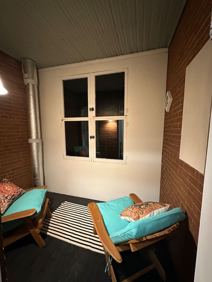 enclosed porch room. 