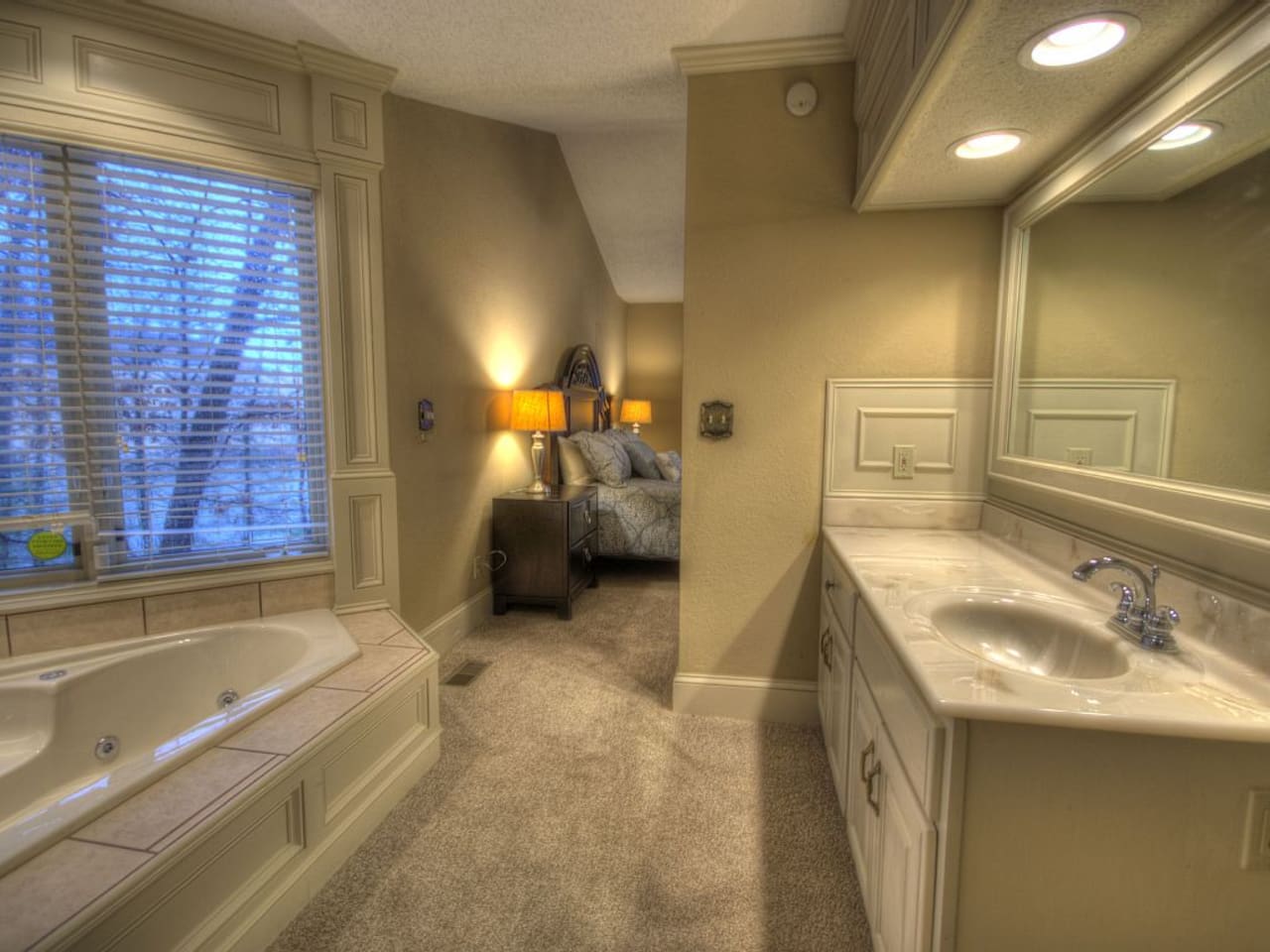 Master bath with lake view Jacuzzi, upper level