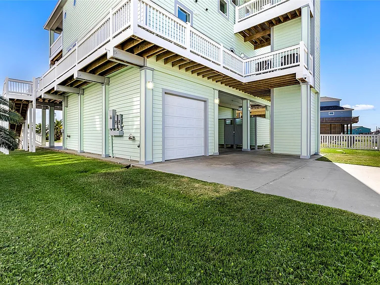 Crystal Paradise Outdoor Space: Convenient garage parking included for your vehicle’s safety and ease.