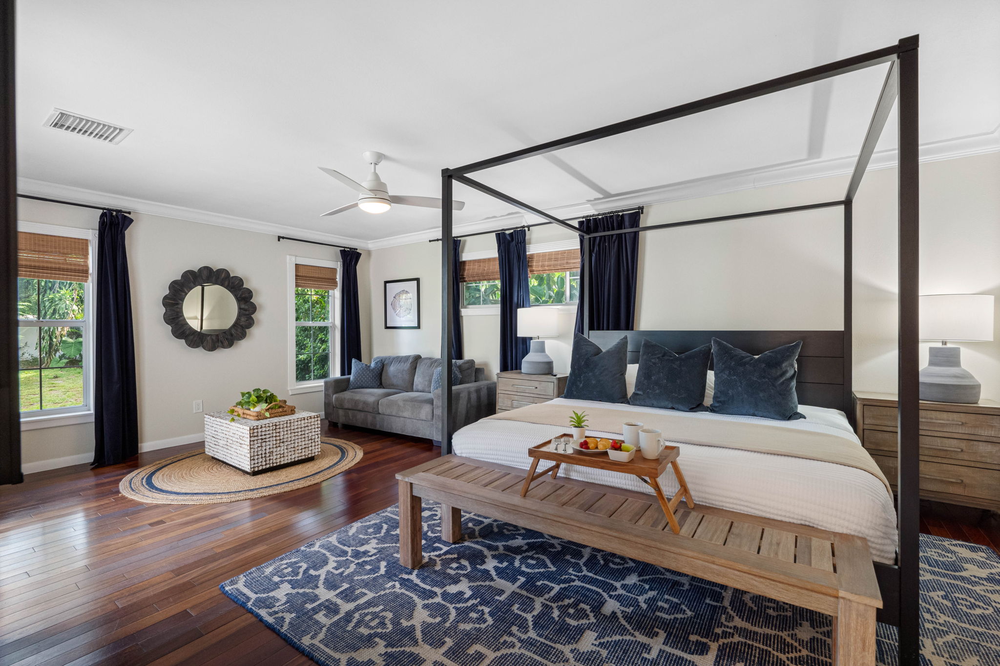 Elegant retreat with warm wood floors, stylish décor, and private lounging space.