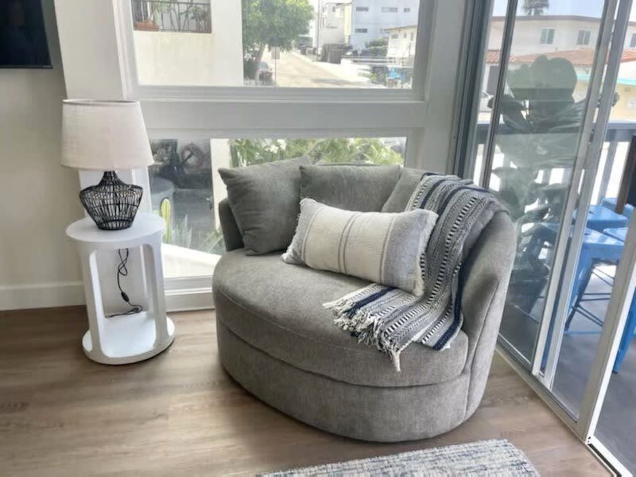 This swivel loveseat provides extra seating in the living room but also pivots to provide a comfy option for enjoying the view.