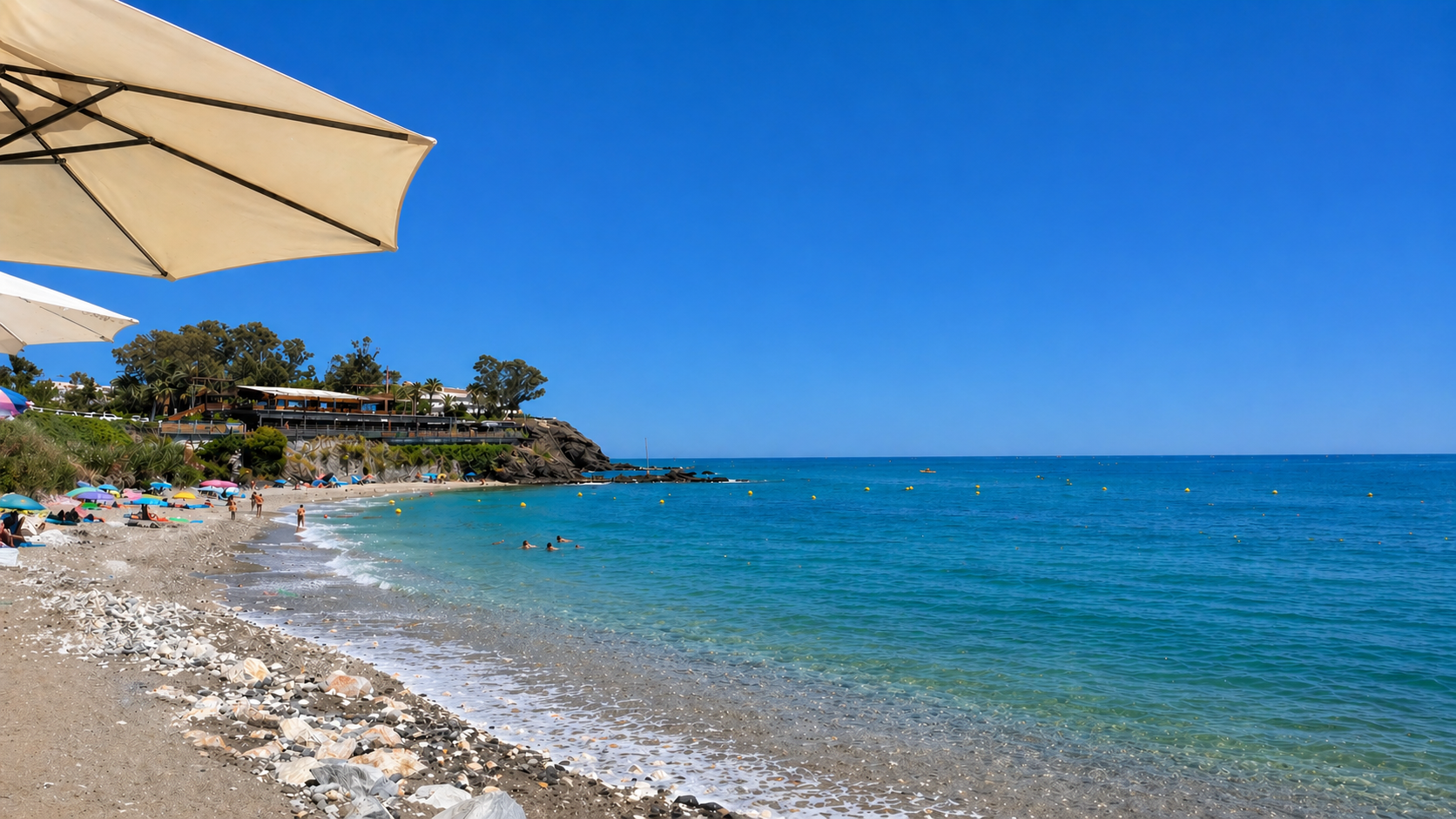 Malibu Palace Beach – Quiet seaside spot with crystal-clear waters, ideal for swimming and relaxing by the Mediterranean, within walking distance.