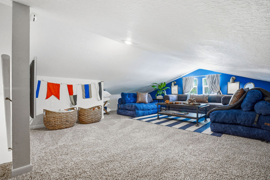 Tucked upstairs at The Yacht Club, this loft is the perfect spot to unwind after a day on the water. Smooth sailing and good company welcome here.