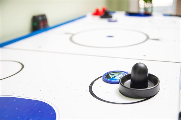 Enjoy endless laughter and connection with friendly air hockey battles, perfect for cozy evenings and unforgettable family fun.