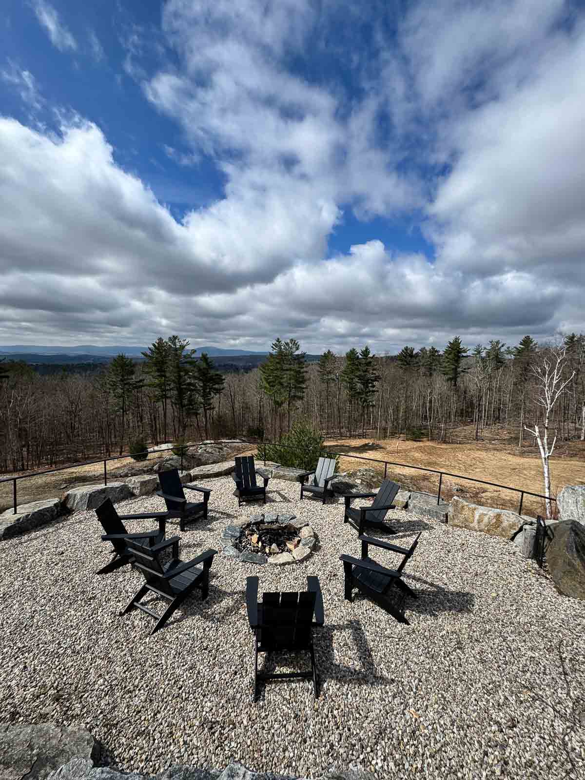 Fire pit gathering area with big sky and Berkshires valley views &mdash; Sunset Falls 167 acres