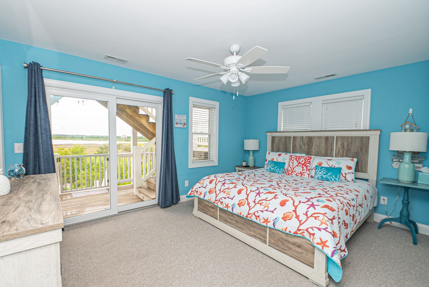 King Master bedroom, private baclony overlooking the intercoastal. Private bath. linens and towels provided as well as starter paper supplies, shampoo and soap. Iron board, extra pillows and blankets