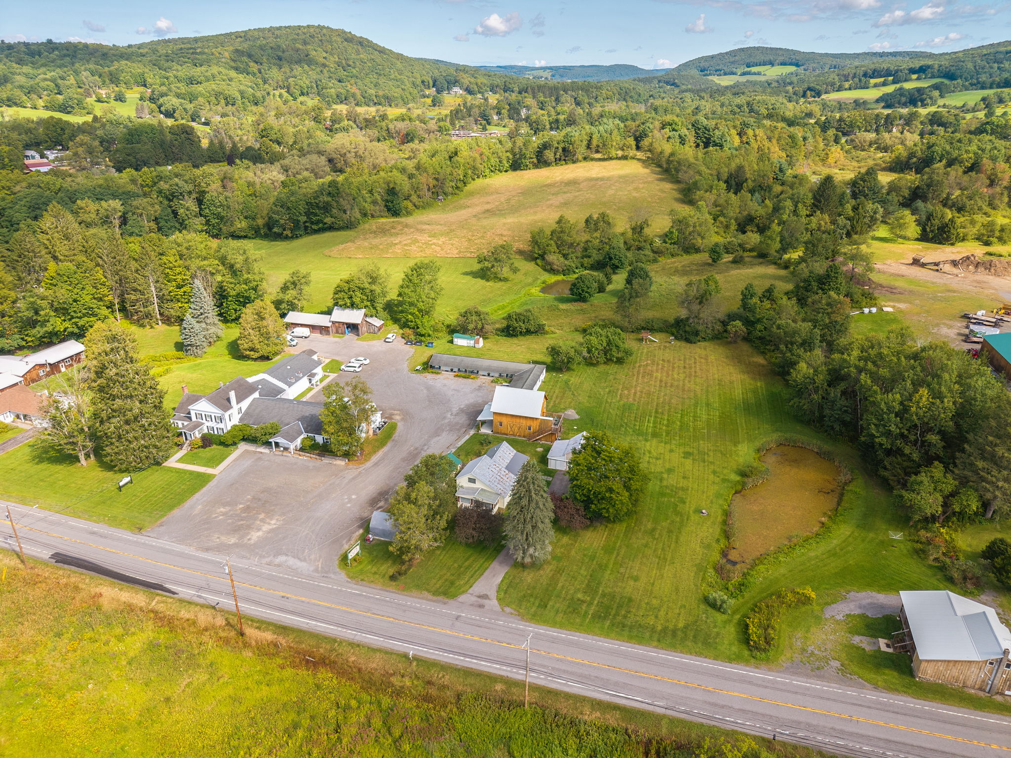 Open lawns and rolling countryside surround this peaceful getaway.