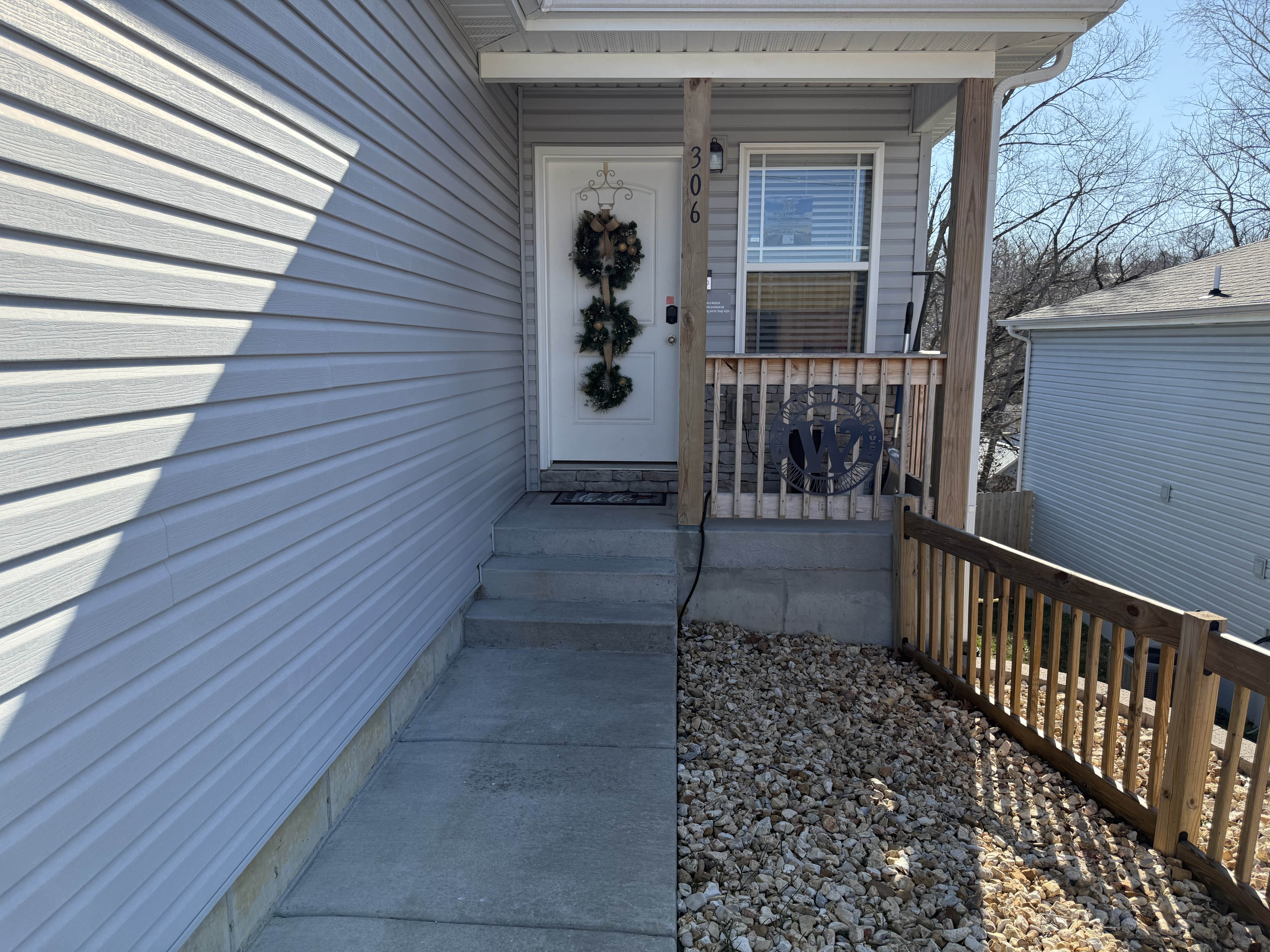 open path with lights to front door