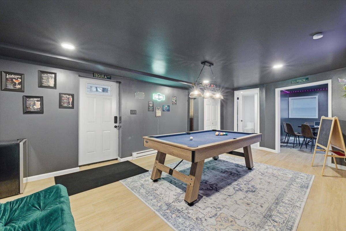 Large pool room for game nights w/ extra couch