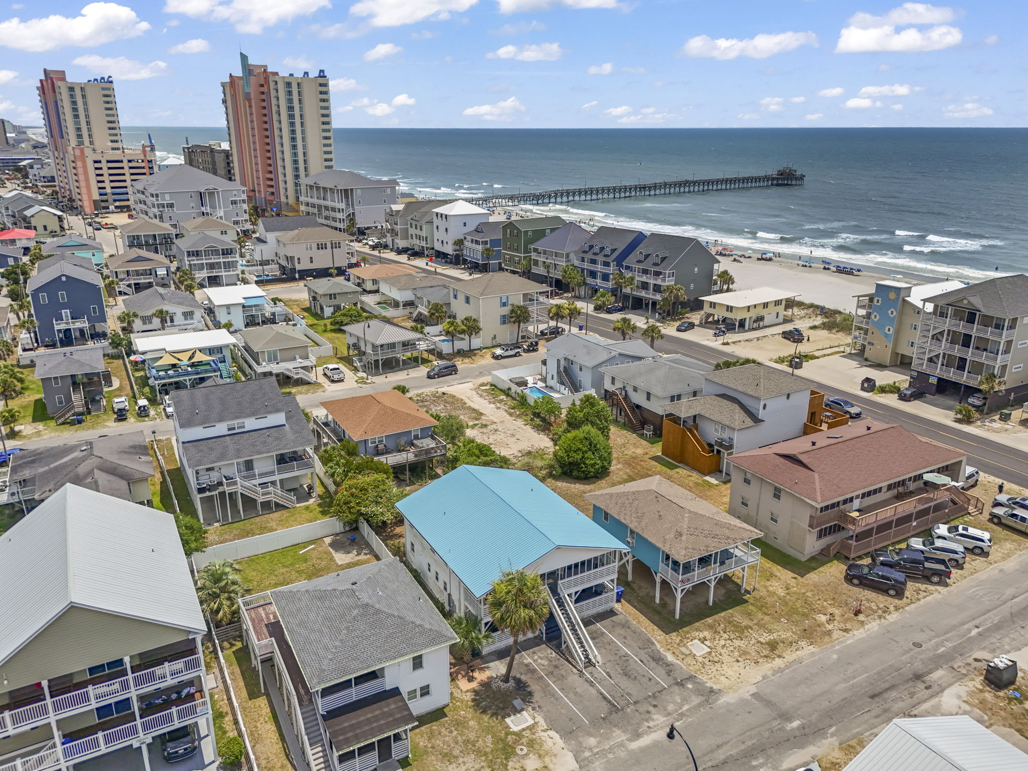 The bottom floor of this 4Plex that includes two units that are each 2 bedroom 1 bath giving you 4 full bedrooms and 3 bathrooms.  Walking distance to Cherry Grove Fishing Pier, Resturaunts and more!