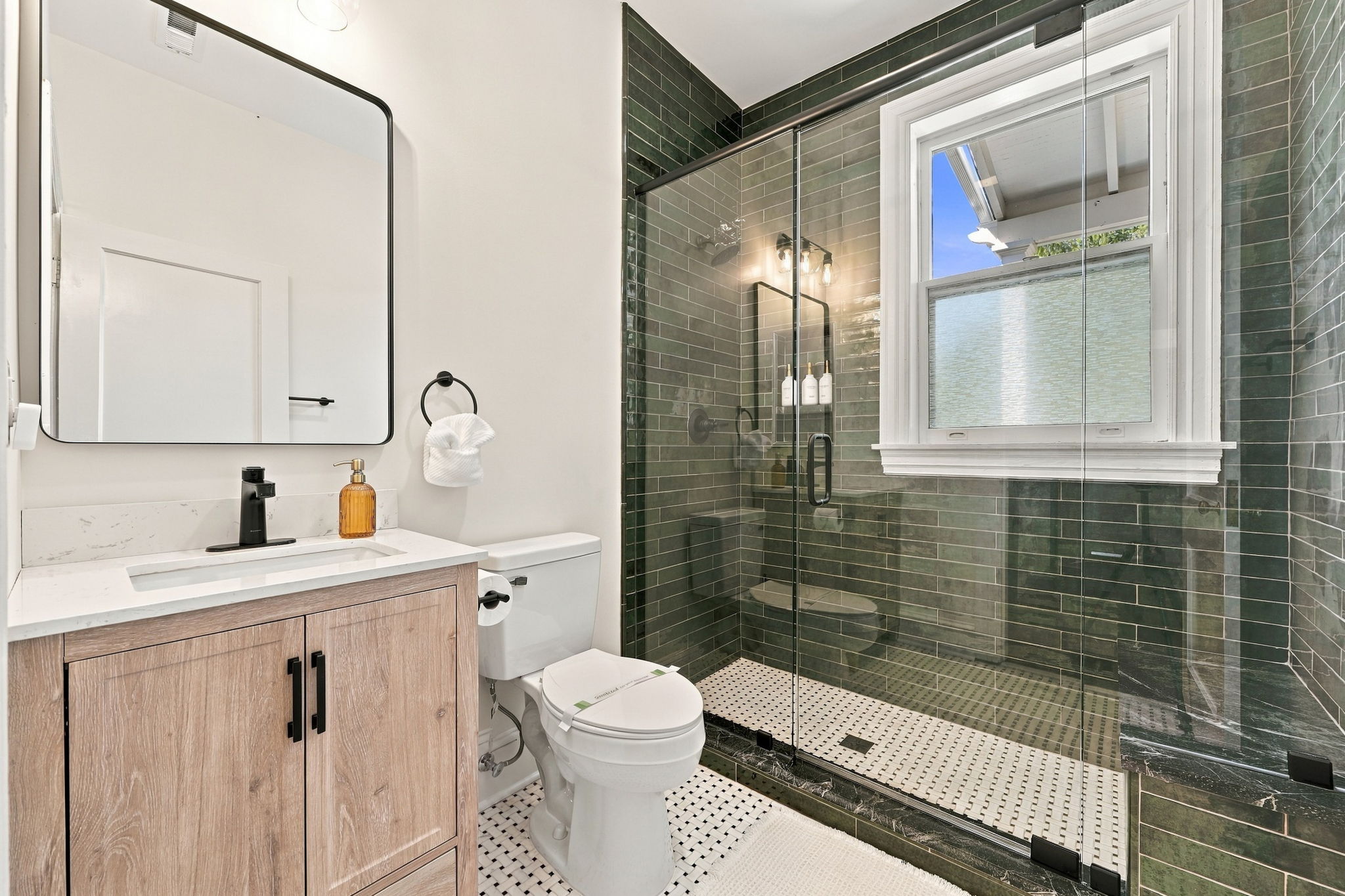 Modern Bathroom Oasis: Enjoy sleek, stylish finishes and a bright, refreshing space!