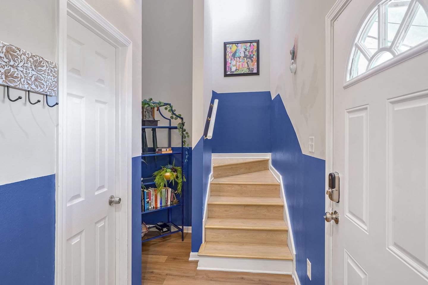 Internal access to downstairs or upstairs, each with a kitchen, living room, 3BR/2BA, & laundry!  This is where you will enter the house, greeted immediately by unique art and a place to leave your bags.  Ask about our free luggage storage!