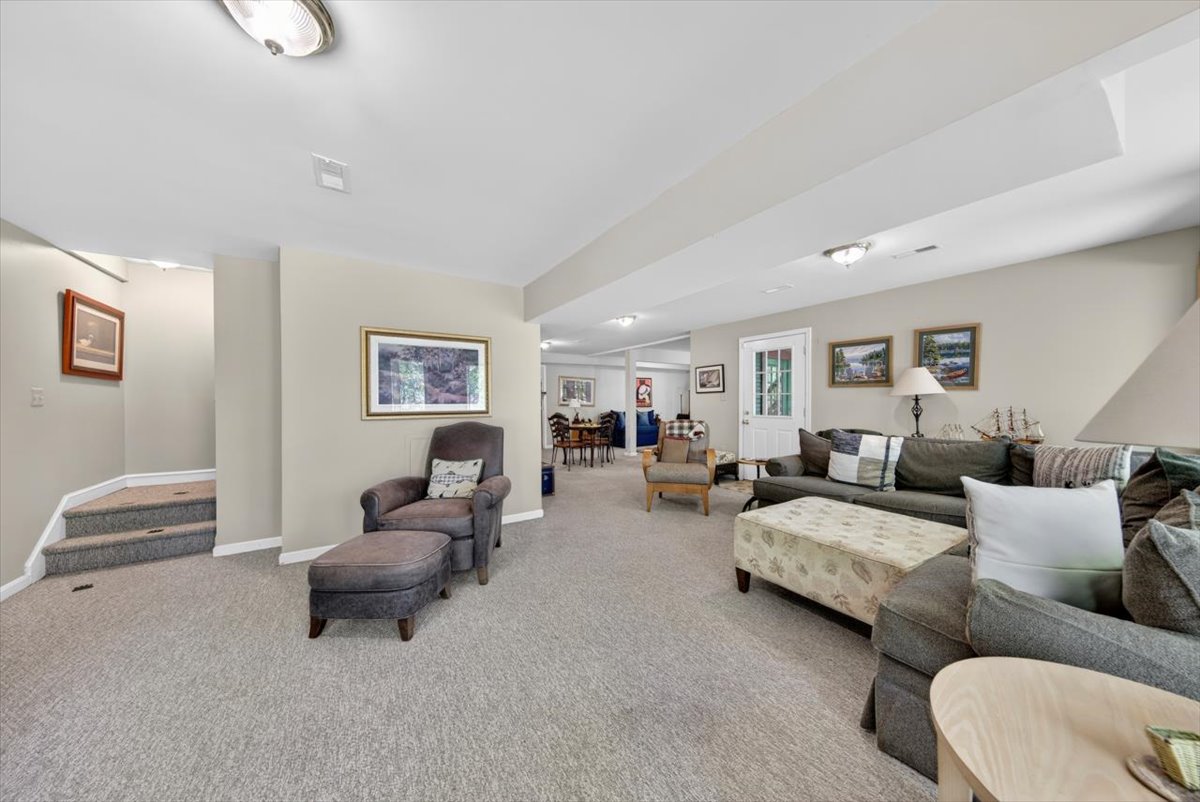 Spacious basement hangout for movies and games.
