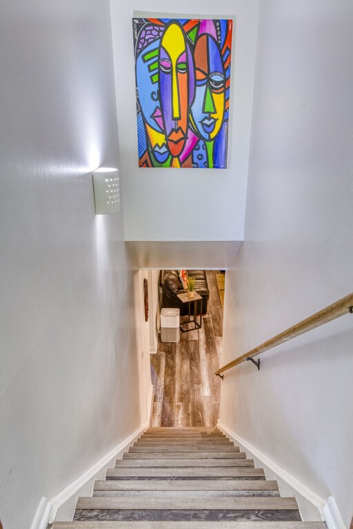 Single flight of stairs leading into the suite.