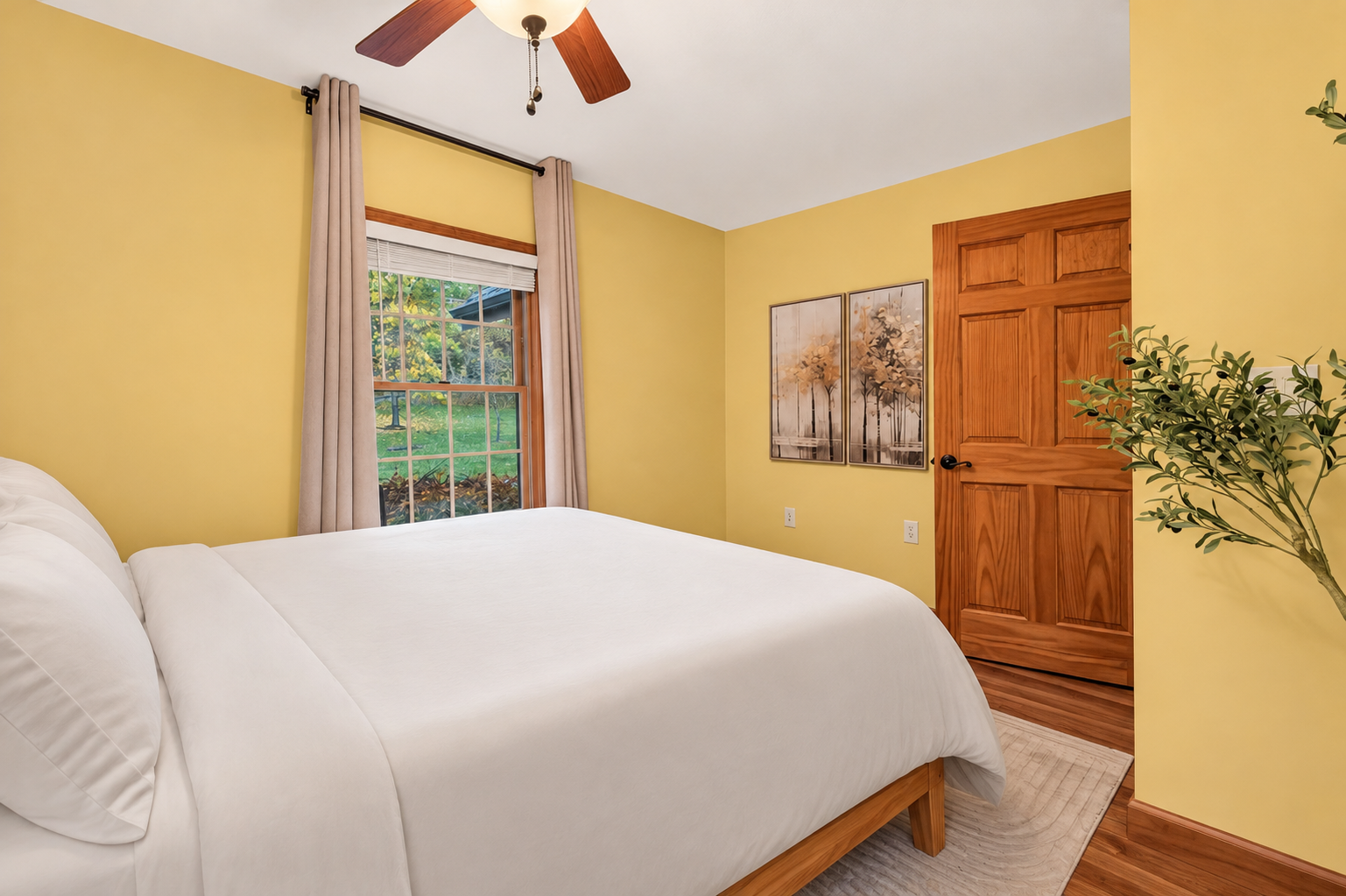 Bedroom 1 with wooden furniture and natural light
