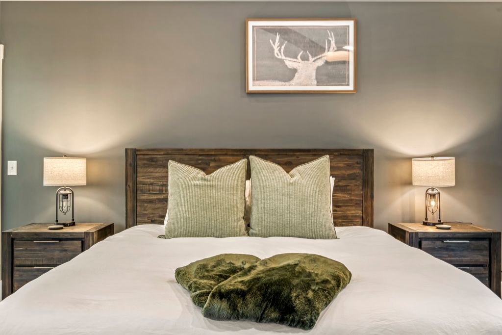 Unwind, exhale, and sink into serenity. ✨ Plush bedding, warm tones, and the soft glow of bedside lamps make this the calmest corner of Sunday Basecamp