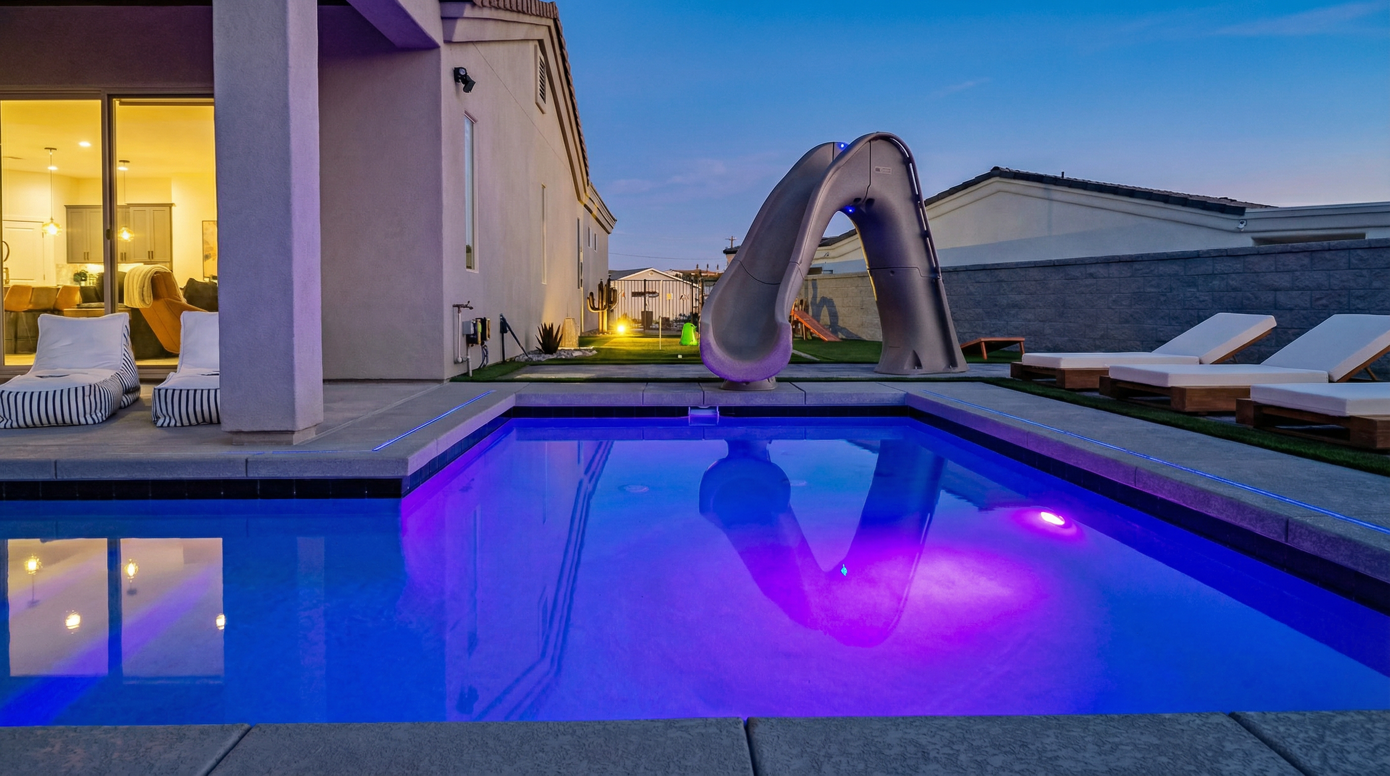 Plunge into the pool on the 8-foot water slide!
