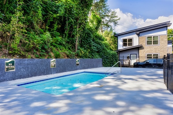 Fun and relaxation await with a shimmering pool, a playground for the little ones, and a spacious dog park to keep everyone happy.