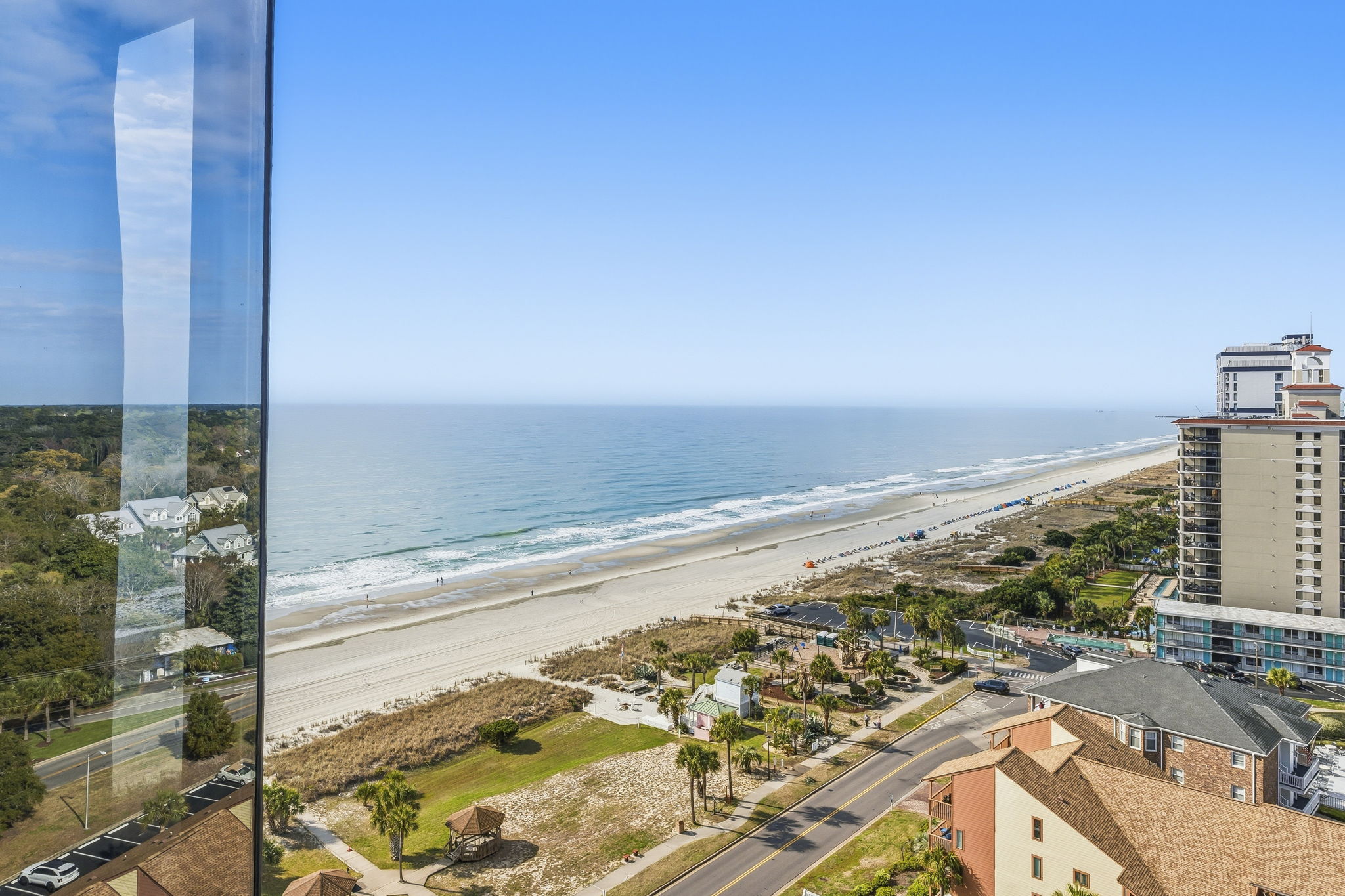 View of the beach and coastline from the penthouse balcony