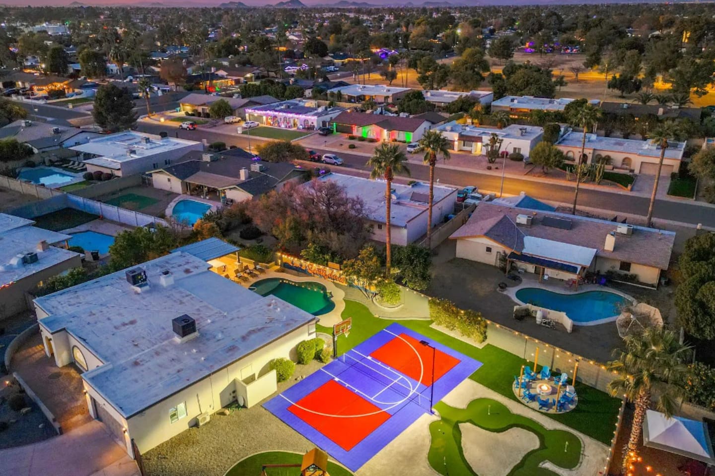 Putting green, sport court, and pool in one frame — there's a reason groups keep coming back to this one.