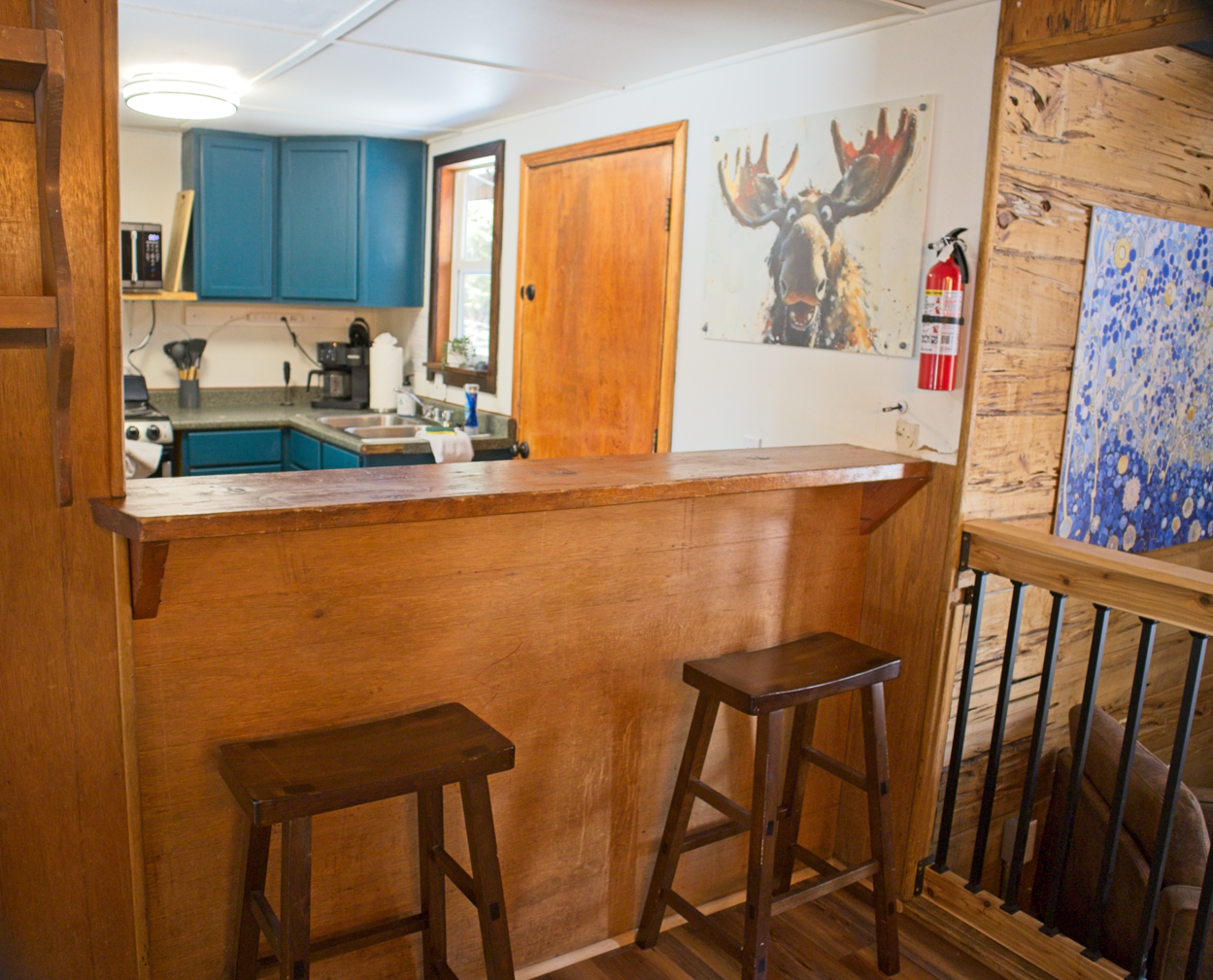 Pull up a seat at your cozy breakfast bar, where warm wood tones and an open kitchen make it easy for you to gather, sip, and start your day.