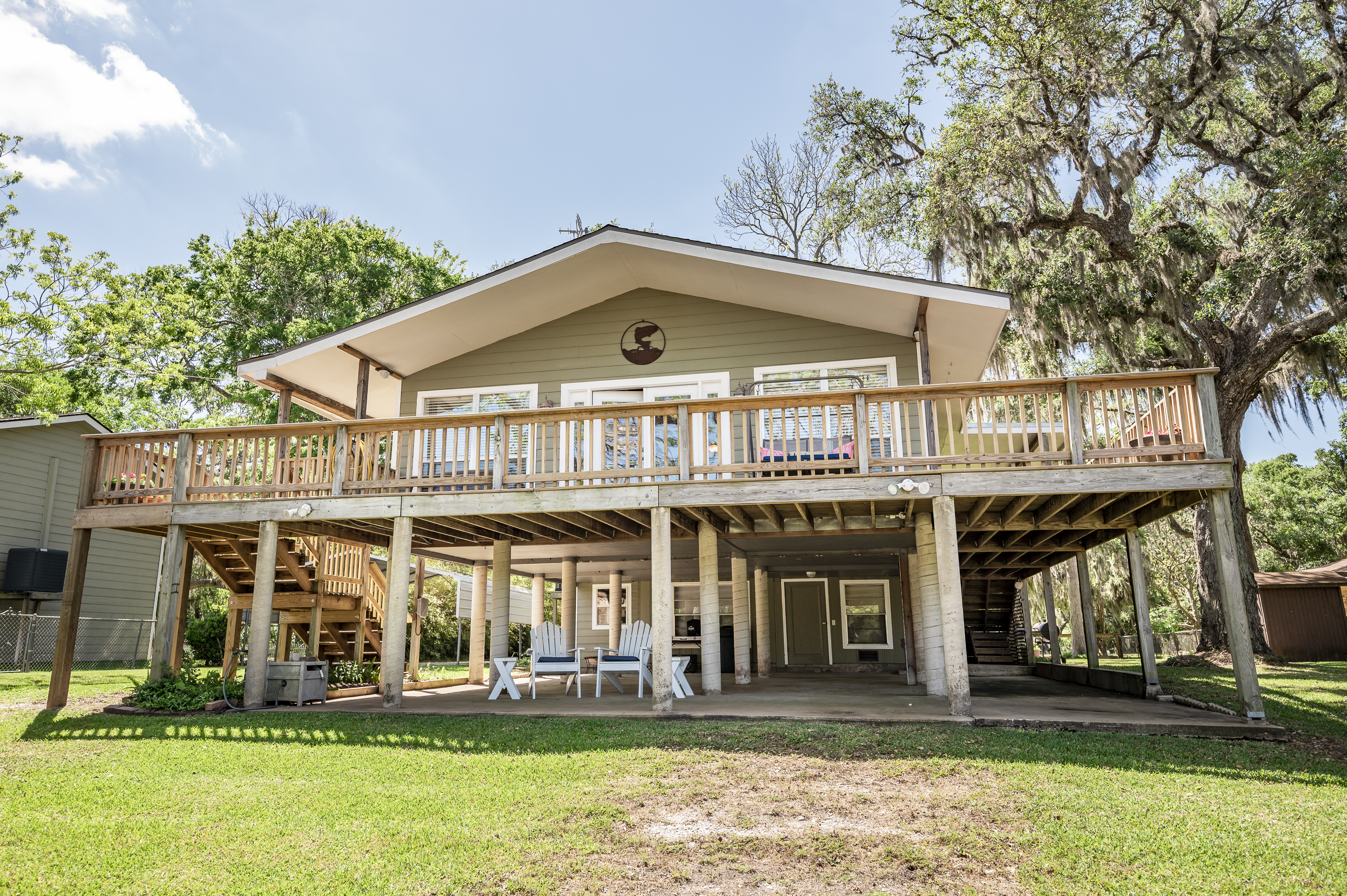 View from the creek side of the house. Amazing patio, overlooking the water!