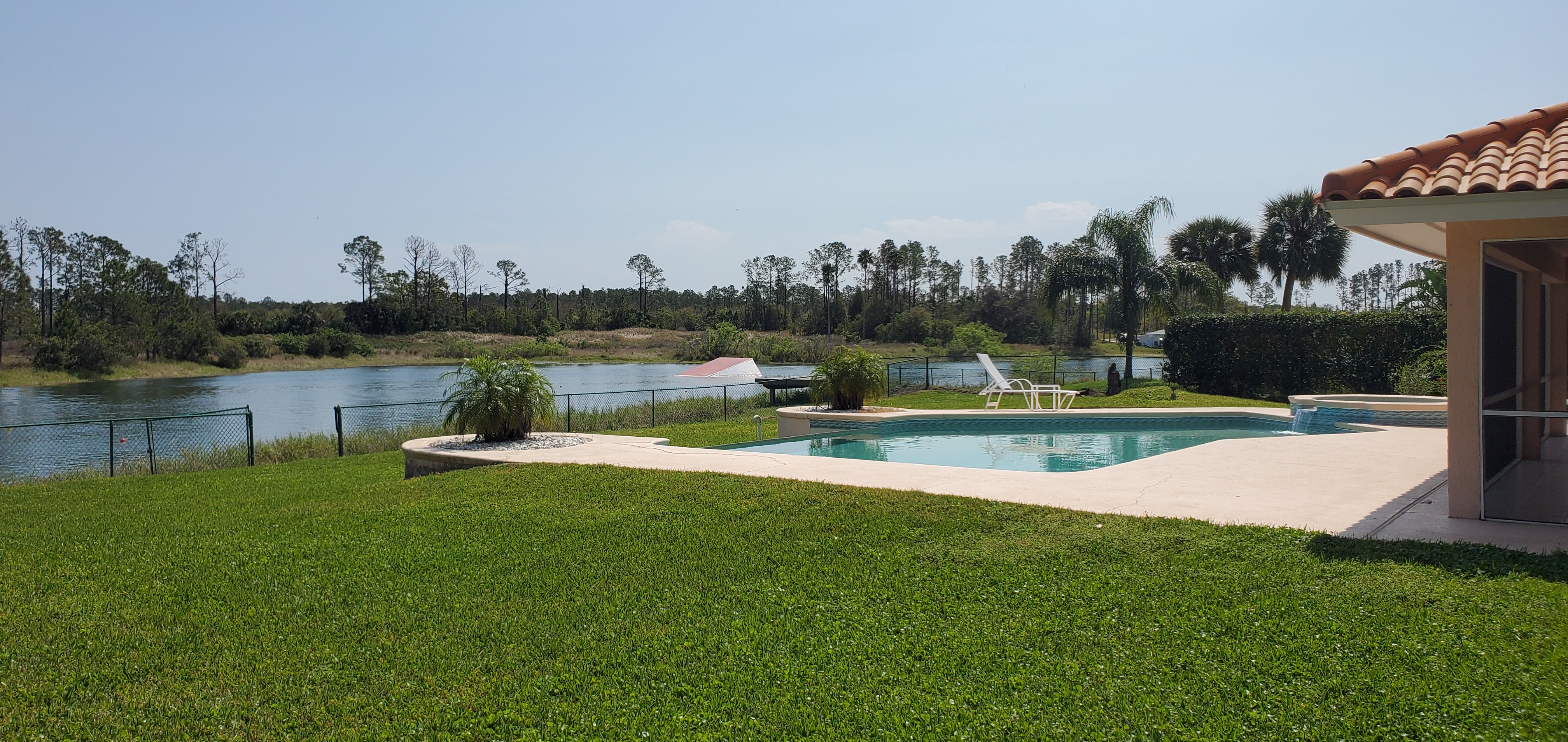 Side view of infinity edge pool and ski jump