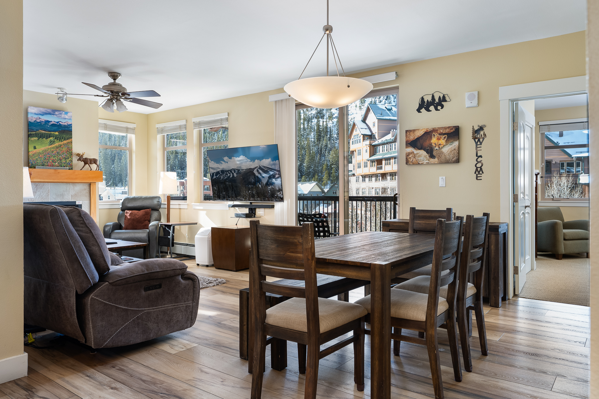 View of sliding door from near front door, dimmable chandlier