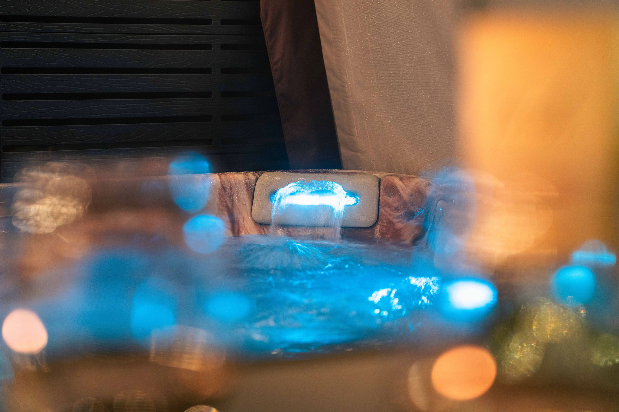 Clean, well-maintained hot tub with soft lighting for the ultimate nighttime soak.