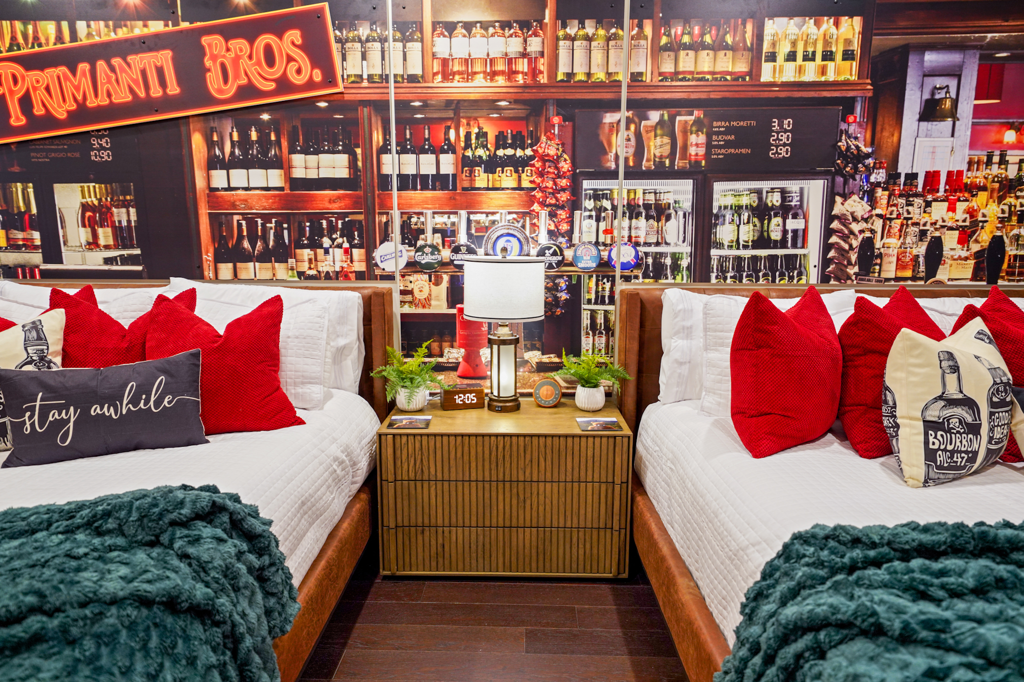 Unique bar-themed guest suite with two queen beds — fun, comfortable, and perfect for extra guests.