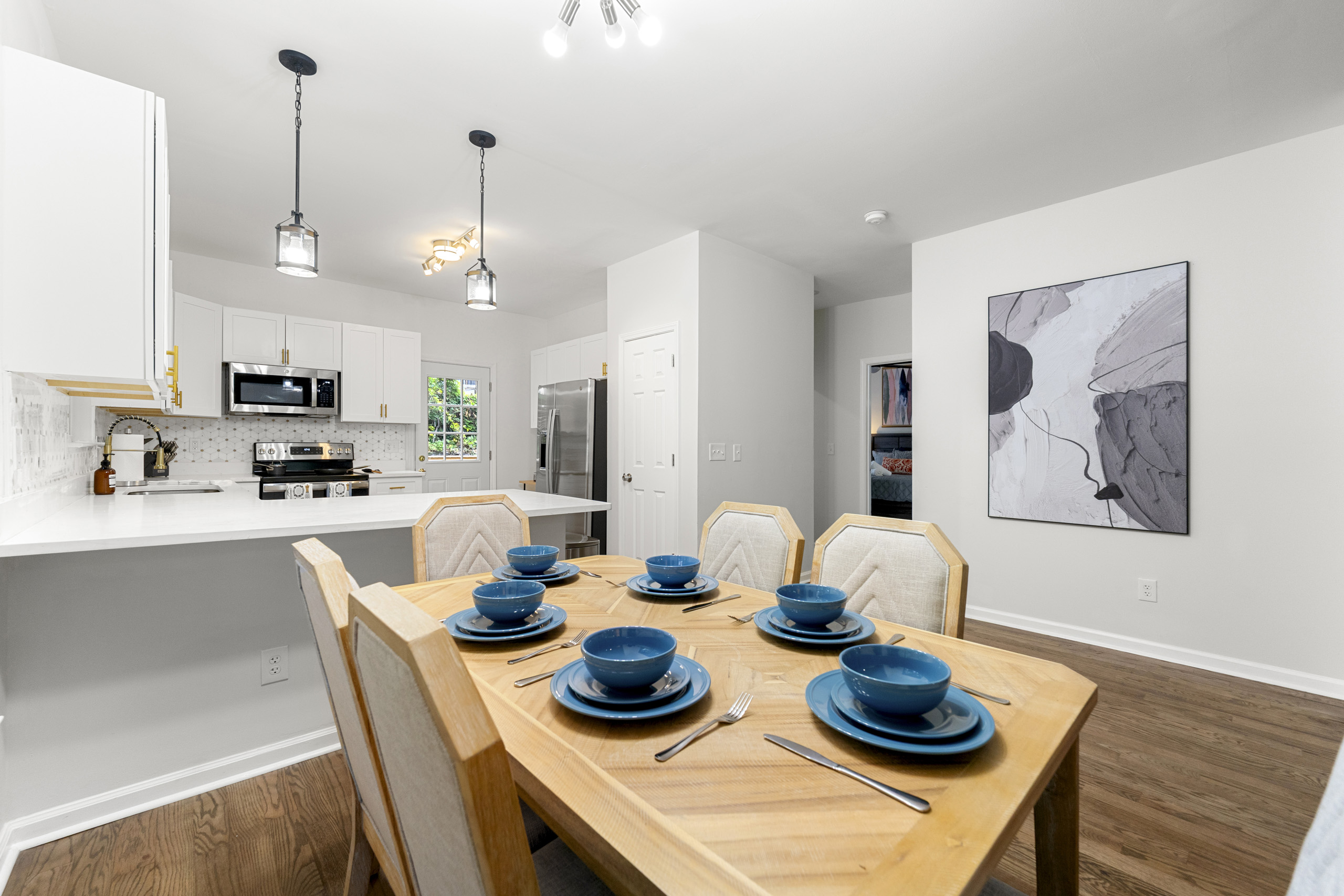 Share delicious meals and great conversations around this modern dining table.