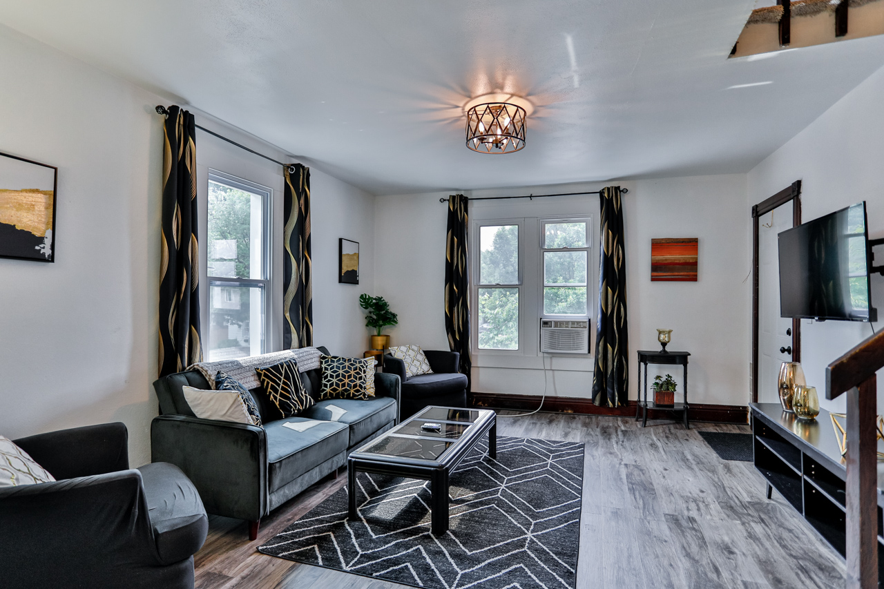 Spacious living room with elegant decor and views