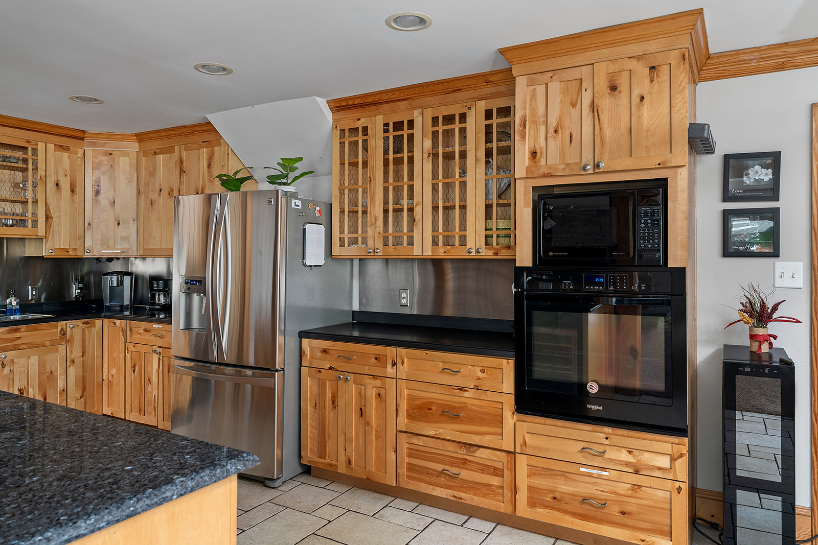 Gourmet Kitchen: Whip up culinary delights in this modern space with sleek appliances and natural charm!