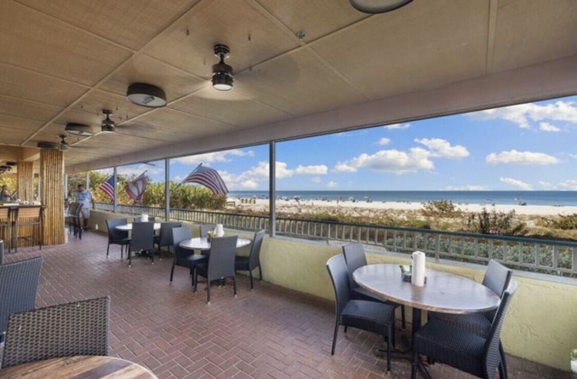 The ONLY weekly beachfront condo rental that has a restaurant in the building
