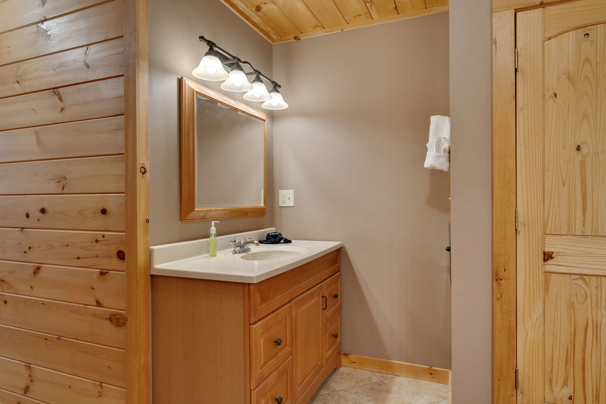 One of two sinks in the master bathroom with is directly off the master bedroom