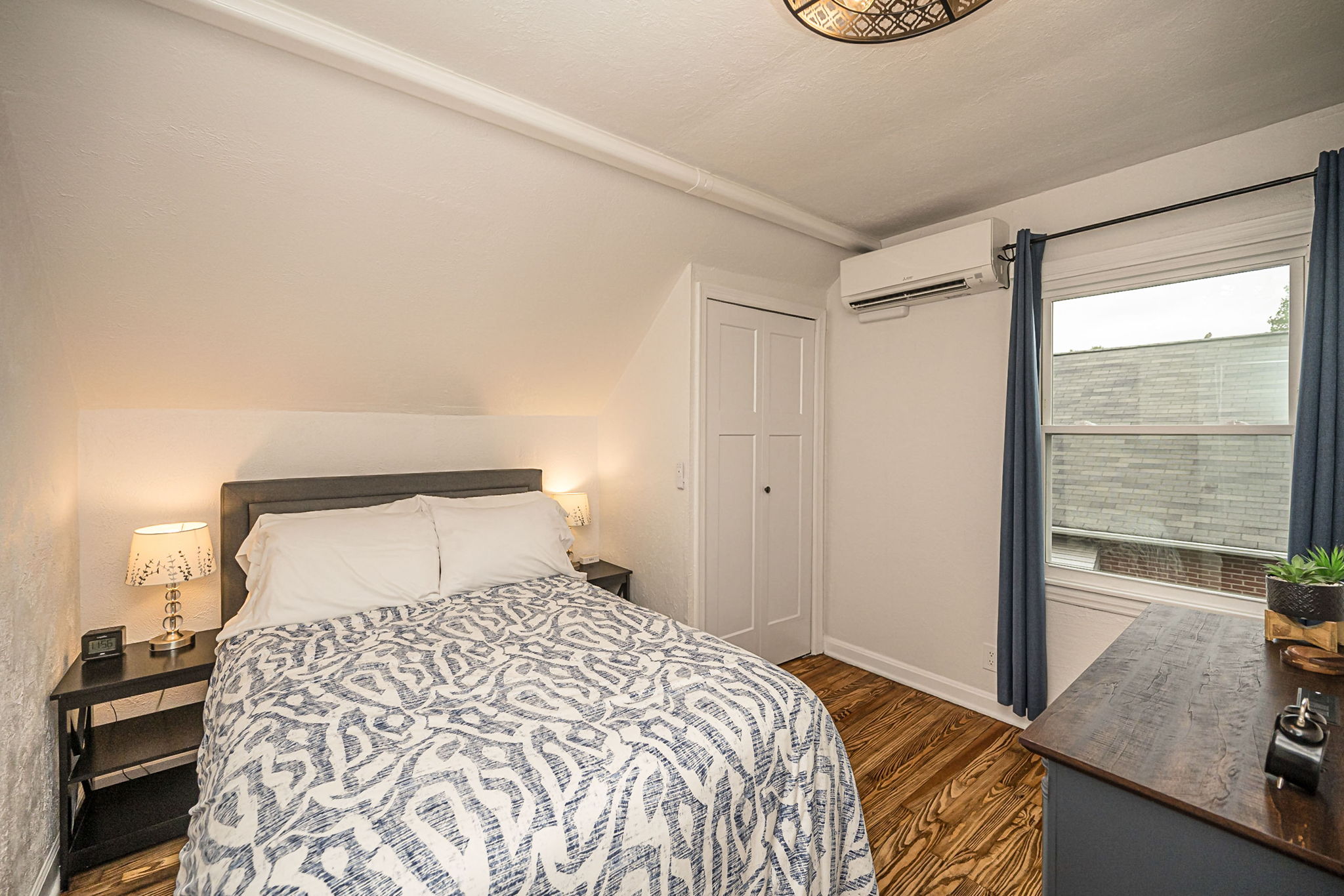 Comfortable upstairs queen bedroom.