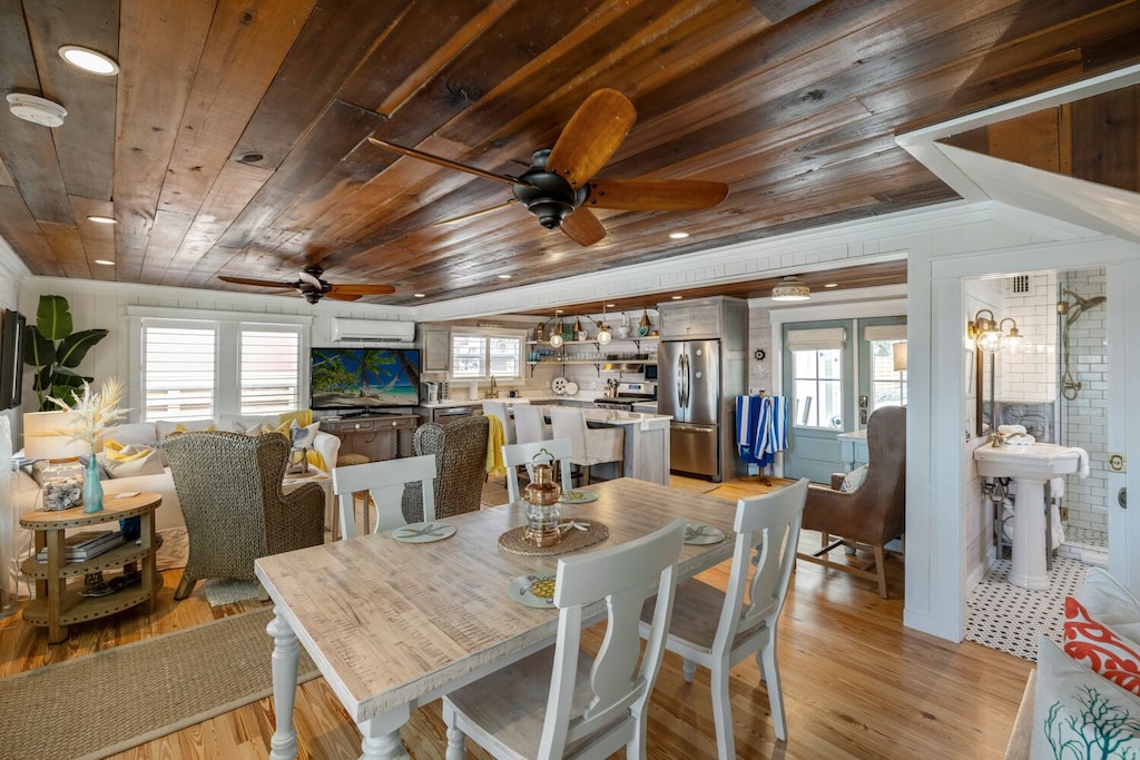 The dining table includes a bench that can be pulled up to seat (6).