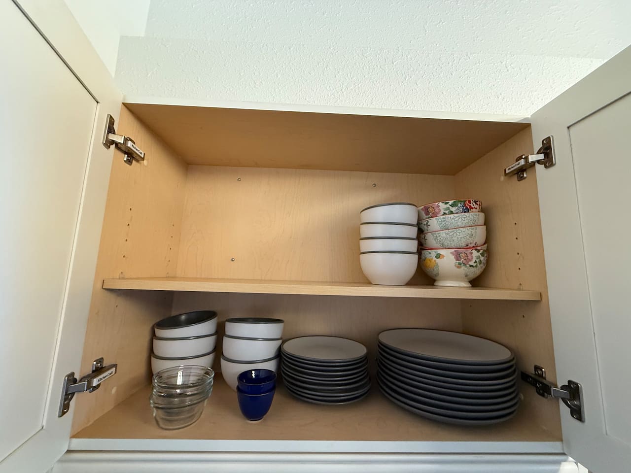 Dishware & Glassware: Ample supply of dishes, glasses, and mugs stored in easy-to-reach cabinets, ready for your group's stay.