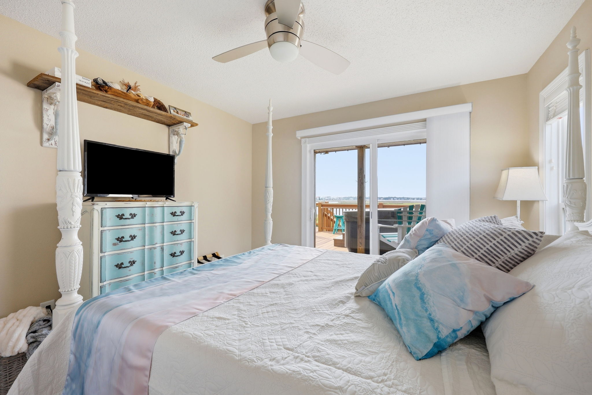 Your own private escape with deck access, a hot tub, and breathtaking water views.