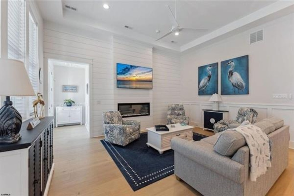 Spacious living room with lush seating